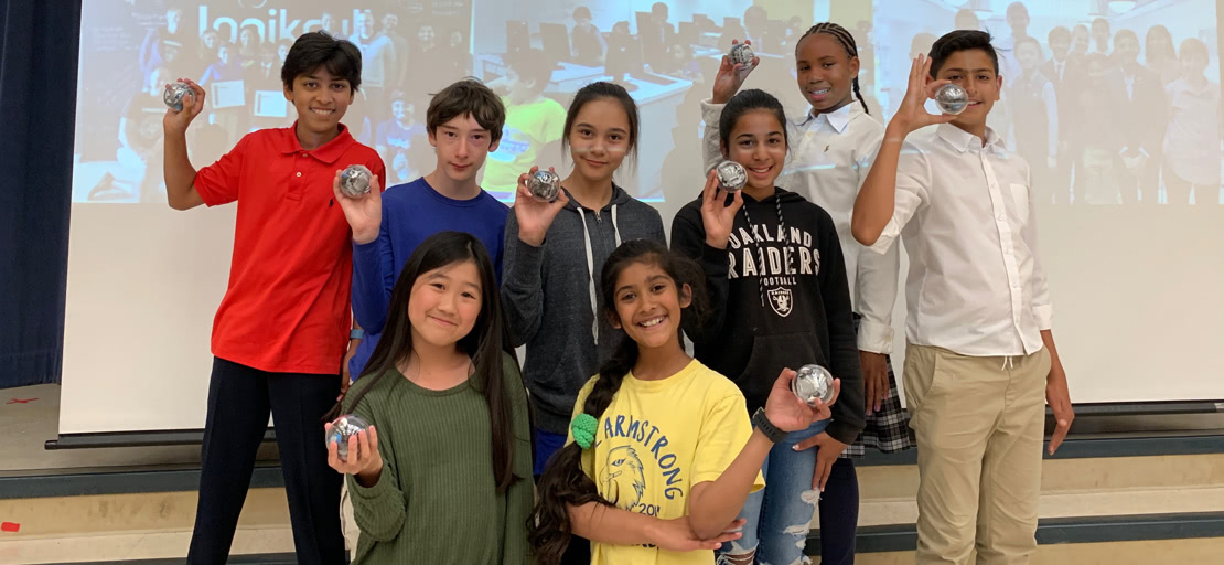 Slide Image - team holding sphero bolts